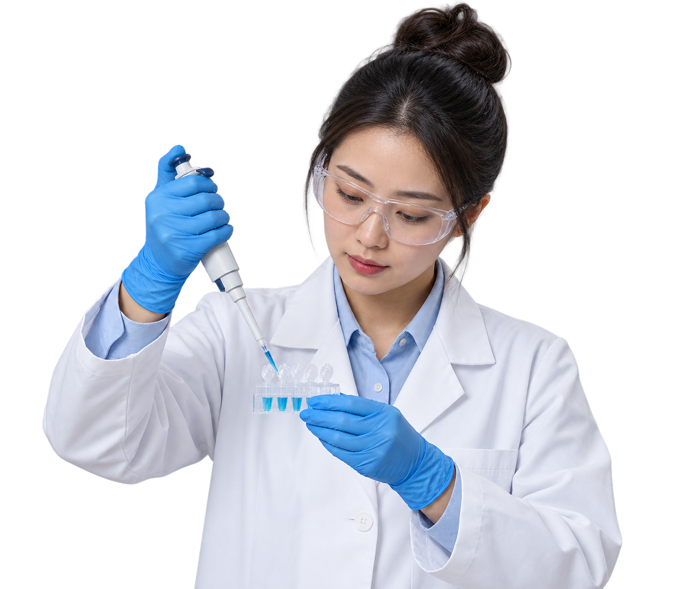 Young female scientist pipetting a sample into test tubes